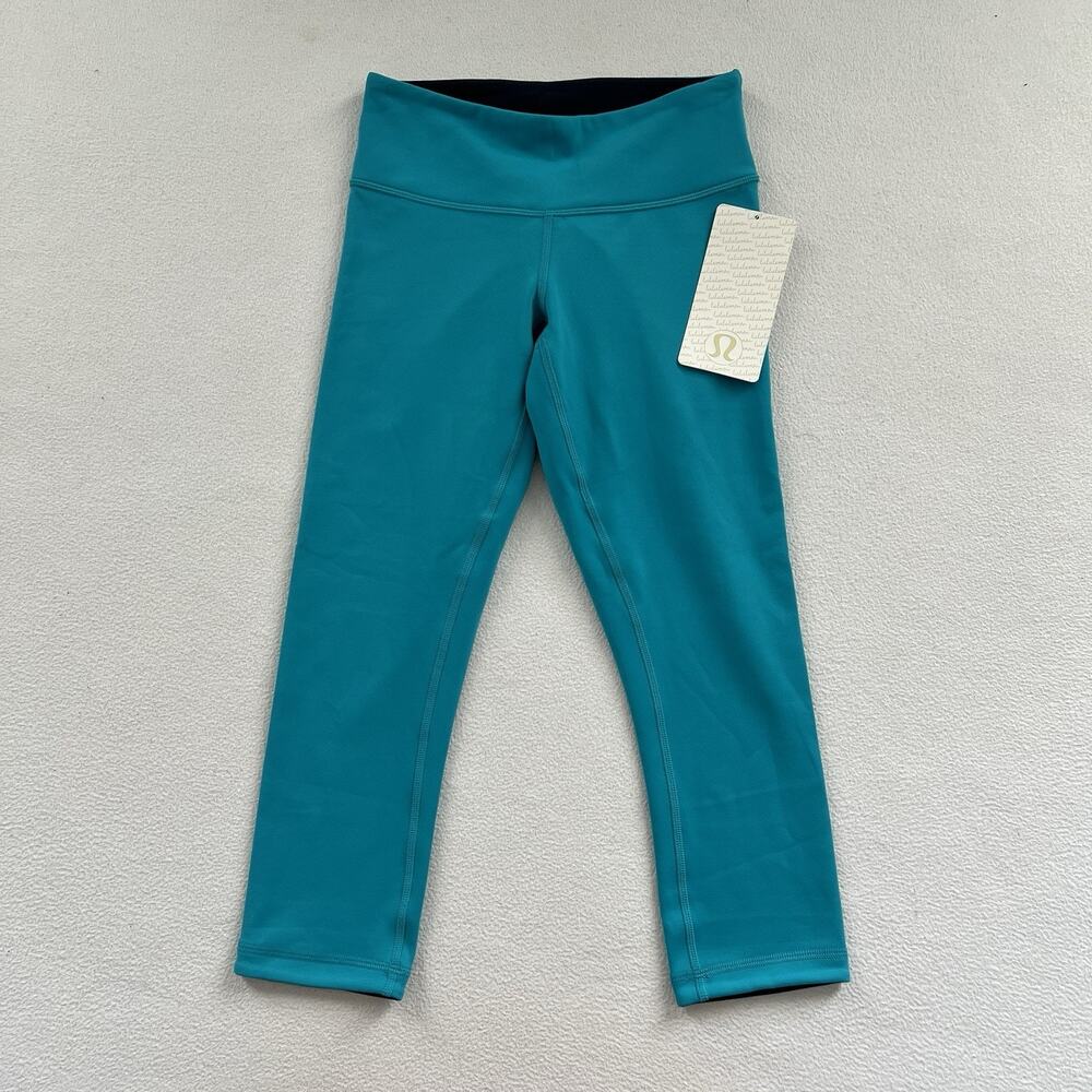 NWT Lululemon Women Surge Inkwell Turquoise Navy Wunder Under Crop Reversible 4